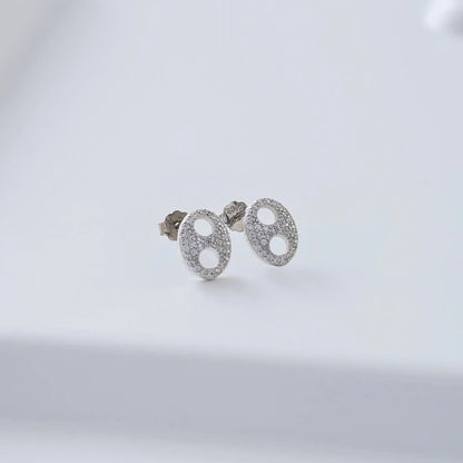 Aretes Topos Gucci Glam 8.6 mm Plata Ley 925 fondo gris unisex