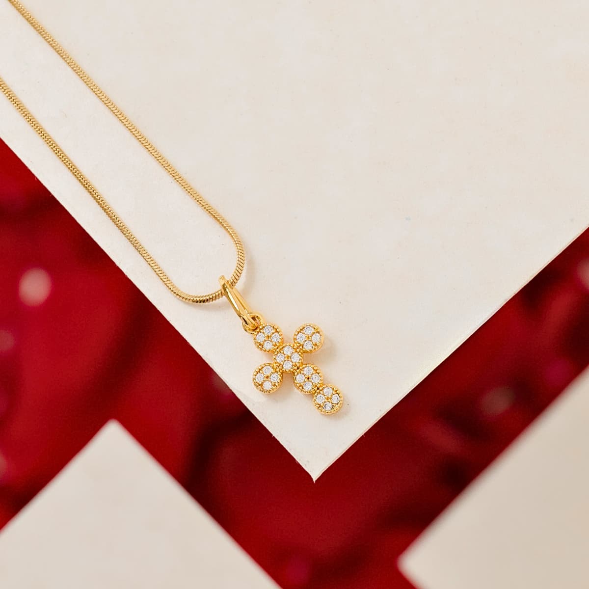 Cadena Serpiente Finita Oro Laminado 18K - Con dije de cruz