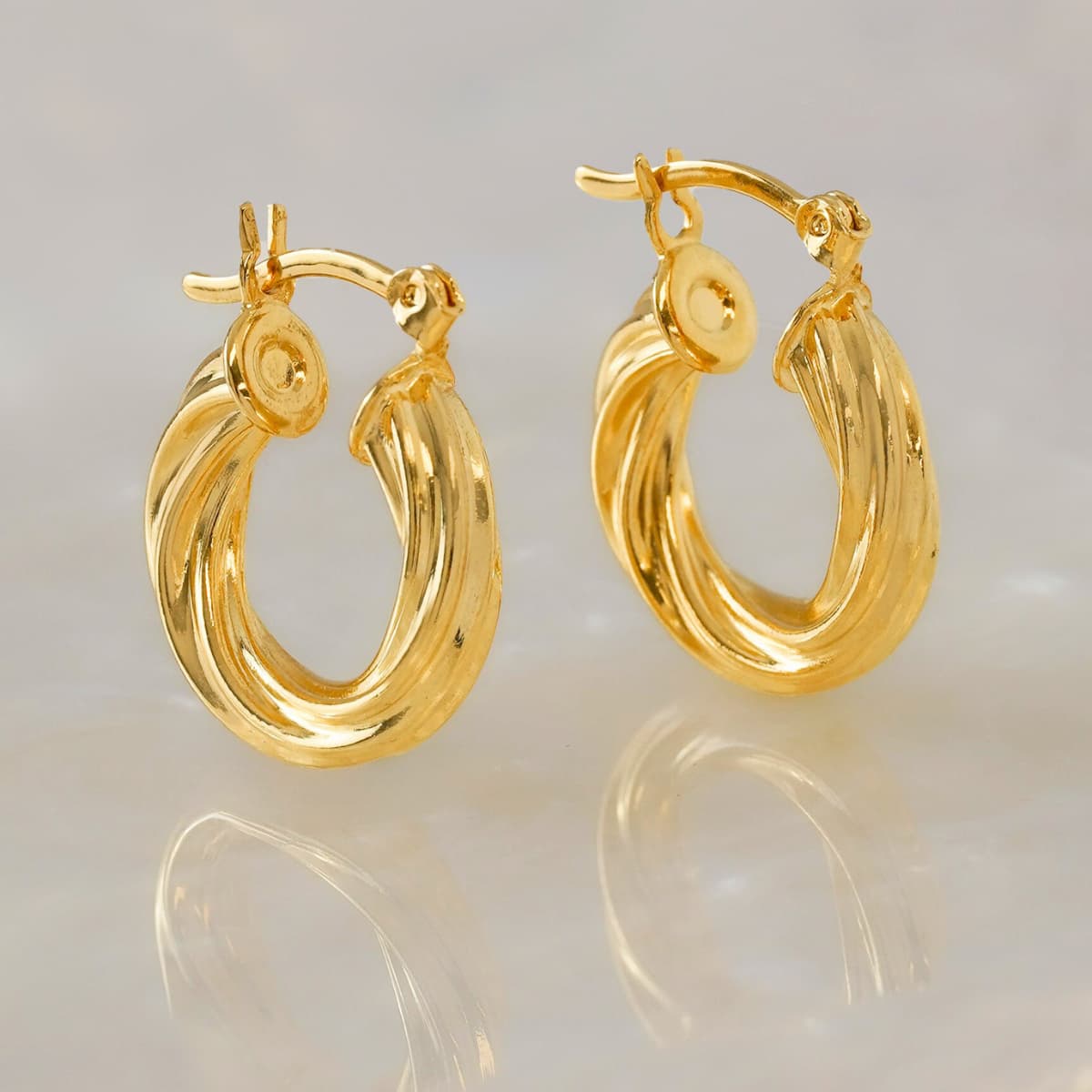 Candongas Twisted Stripes 2 cm y 2,6 cm – Oro Laminado 18K | OM JOYERÍA